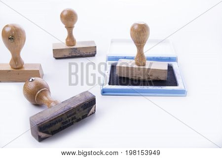 Four old rubber stamp with pad on white background