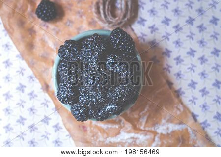 Homemade, sweet, delicious blackberries in a handmade dish