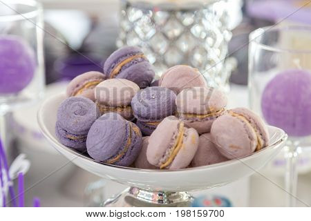 macarons with coffee flavor and coffee beans on white background.