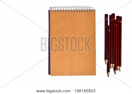 Notebook and pencil on a white background