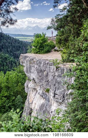 Beautiful viewpoint Tomasovsky vyhlad in Slovak Paradise national park. Hiker on the rock