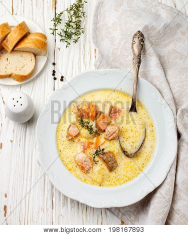 Creamy Fish Soup With Salmon, Potatoes, Onions And Carrots. Kalakeitto. Traditional Dish Of The Finn