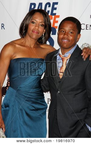 LOS ANGELES - APR 29:  Regina King and son arriving at the 18th Race to Erase MS Event at Century Plaza Hotel on April 29, 2011 in Century City, CA..