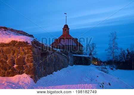 The February evening at the ancient tower of Lars Torstenson. Fortress Korela, Russia