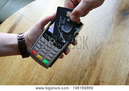 Contactless Payment Card Pdq Background Copy Space With Hand Holding Credit Card To Pay