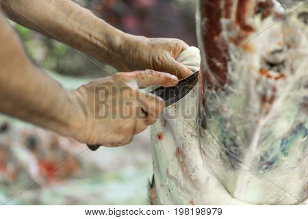Butcher disassembles carcass of young veal work process Ukraine