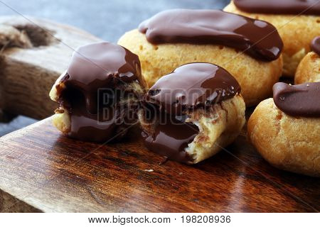 Traditional French Dessert. Eclair With Chocolate Icing. Pastery Concept