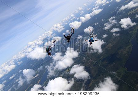 Skydiving over beautiful Norway. Clouds, sun and sky