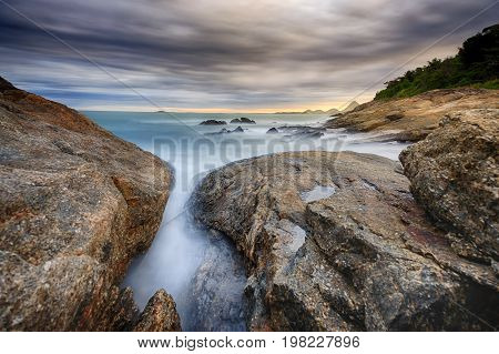 Stunning Sunset On The Beach And Dramatic Clouds At The Sky. Hdr (high Dynamic Range) Picture.