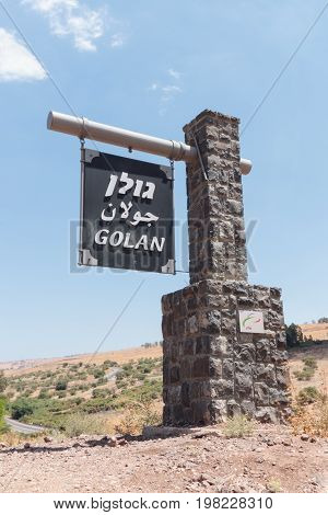 Golan Heights near to Qatsrin city, Israel - July 29, 2015 : The landmark on the roadside marking the beginning of the Golan Heights in Israel
