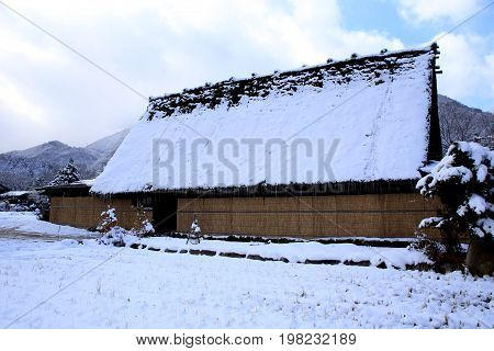 A gassho-zukuri farmhouse. Many of these farmhouses in the village proper have been converted into inns for tourists.