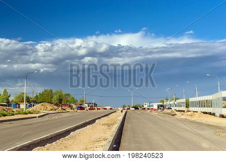 Construction of high-speed bypass road around Krasnoe Selo Saint Petersburg. Heavy machine equipment for excavation works at civil industrial construction. Russia