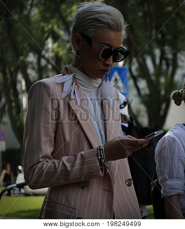 MILAN- 17 June 2017 Esther Quek on the street during the Milan Fashion Week