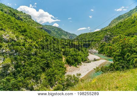 The purest waters of the turquoise color of the river Moraca flowing among the canyons. Montenegro.