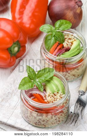 Warm Quinoa Salad With Vegetables - Avocado, Red Onion, Tomatoes, Bell Pepper, Basil And Olive Oil.