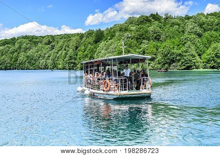 Ferry in the Plitvice Lakes - JUNE 29: Ferry on the Plitvice Lakes close-up. June 29, 2017. Croatia. Plitvice Lakes.