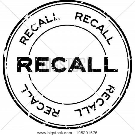 Grunge black recall round rubber seal stamp on white background