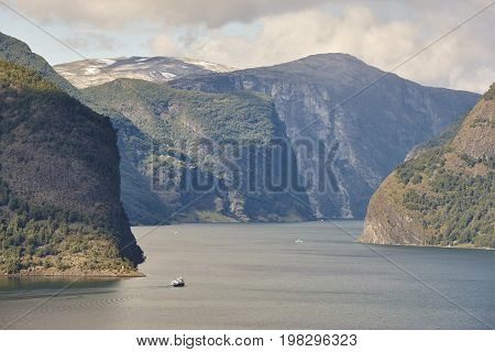 Traditional norwegian fjord landscape with mountains and water. Travel background