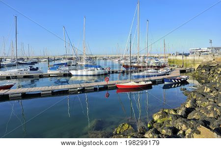 Yachts docked at Howth harbor in ireland
