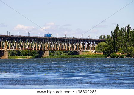 Bridge With Traffic Over The Dnieper River In Kremenchug, Ukraine