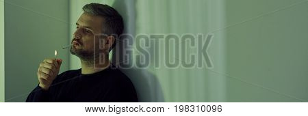 Lonely Man Smoking Cigarette