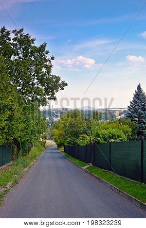 Lovosice, Czech Republic - July 05, 2017: Asphalt Path In Lovosska Street  Leading From Lovos Hill T