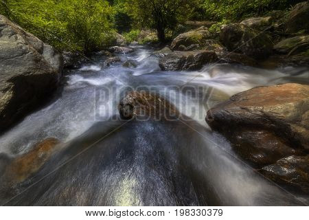 Beautiful waterfalls in national park in Thailand. Khlong Lan Waterfall Kamphaengphet Province