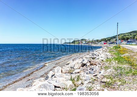 Cityscape Of Grosses-roches Village Town And Saint-lawrence River During Day With Colorful Houses