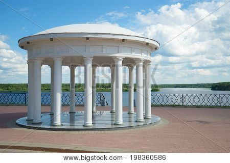 Gazebo-rotunda on the background of the Volga river on a sunny July day. Myshkin, Russia