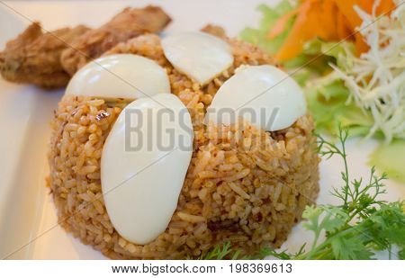 Spicy fried rice with boiled egg stock photo