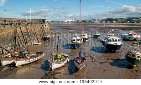 Boats at low tide in Minehead harboard Minehead Somerset UK.