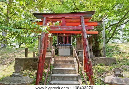 AIZUWAKAMATSU JAPAN - MAY 30 2017: Inari Shinto Shrine in Aizu-Wakamatsu Castle Japan. Inari is goddess of fertility rice tea sake agriculture industry general prosperity and worldly success