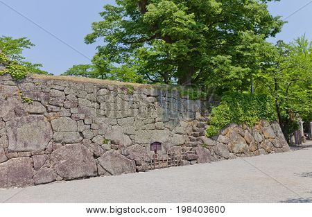 AIZUWAKAMATSU JAPAN - MAY 29 2017: Stone walls with Mushabashiri stairs in Aizu-Wakamatsu Castle (Tsuruga-jo) Japan. Castle was founded in 1384 by Ashina Naomori and demolished in 1874