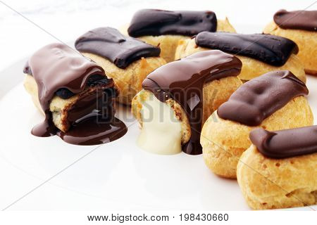 Traditional French Dessert. Eclair With Chocolate Icing. Pastery Concept
