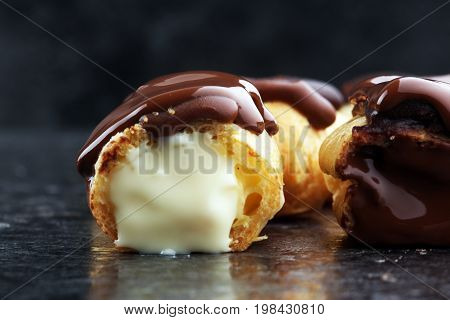 Traditional French Dessert. Eclair With Chocolate Icing. Pastery Concept