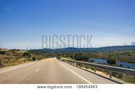 Autovía N-631. Road, horizon, car. Spain. Picture taken - 29 july 2017.