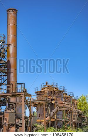 Abandoned Rusted Old Machines And Storage Units In A Gas Industry At Gas Works Park Seattle