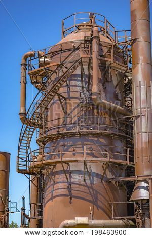 Abandoned Rusted Machines And Storage Units In A Gas Industry At Gas Works Park Seattle