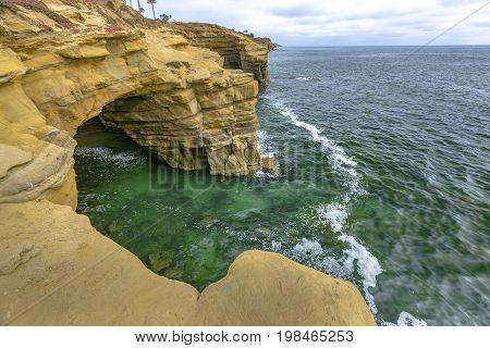 Caves On The Coast Of Point Loma With High Tide Waters