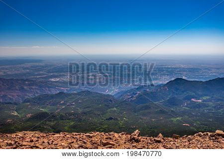 Pikes Peak is the highest summit of the southern Front Range of the Rocky Mountains. The ultra-prominent fourteener is located in Pike National Forest 12 miles west of downtown Colorado Springs. The mountain is named in honor of American explorer Zebulon