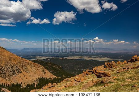 Pikes Peak is the highest summit of the southern Front Range of the Rocky Mountains. The ultra-prominent fourteener is located in Pike National Forest 12 miles west of downtown Colorado Springs. The mountain is named in honor of American explorer Zebulon