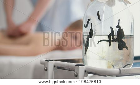 Bank with medical leeches - hirudotherapy in clinic. Tibetan Medicine