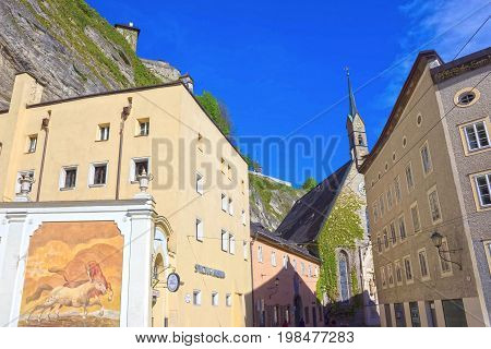 Salzburg, Austria - May 01, 2017: The Horsepond at the Herbert von Karajan Platz in Salzburg, Austria on May 01, 2017