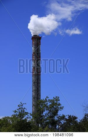 View of a chimney with white smoke