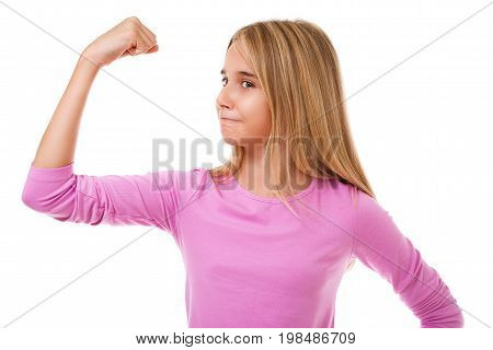 Girl power concept - young teen girl showing her muscular arm for feminine and independent strengthstudio shot