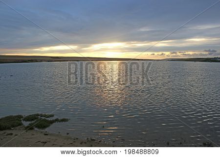 Fleet basin and Chesil bank at sunset