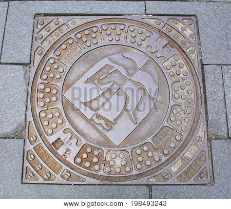 Nykøbing. June-14-2017. Manhole cower in the city of Nykøbing on the island Falster. Denmark