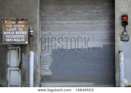 Door and traffic light for truck loading dock