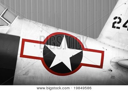 A World War II airplane with bullet holes in the fuselage