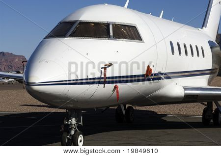 Luxury private jet parked on the runway